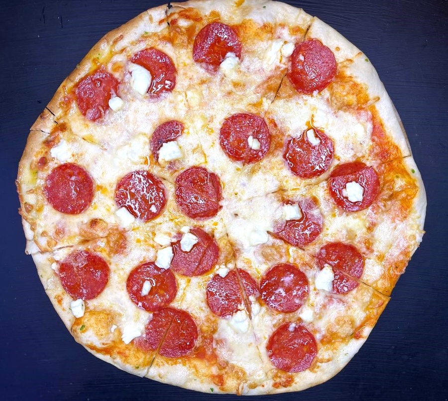 Pizza with "Feta" cheese and "Chorizo" sausage and honey