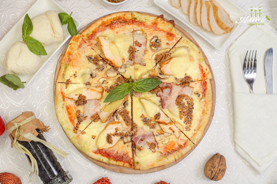 Купити Піца "Ді Такіно" в кафе Амичи Миргород от 250 грн