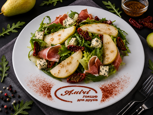 Salad with Prosciutto, sun-dried tomatoes and pear