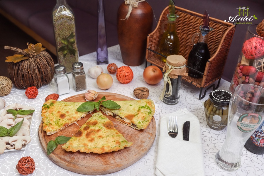 Купить Пицца "Кальцоне" в кафе Амічі Миргород від 150 грн