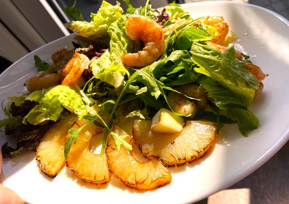 Salad with shrimp and pineapple and Brie cheese