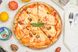 Замовити Піца з кальмарами, копченими мідіями та тигровою креветкою в кафе Амічі Миргород від 290 грн з доставкою