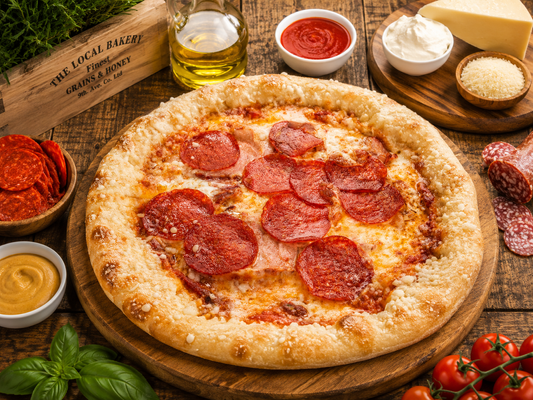 Pizza with cheese edges and salami