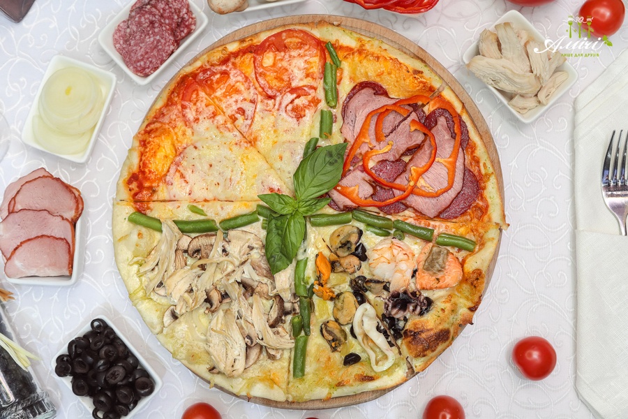 Купити Піца "Чотири сезони" в кафе Амичи Миргород от 290 грн